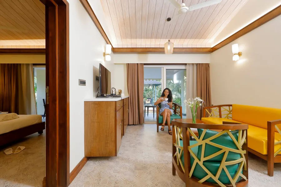 Suite living area with a view of the bedroom